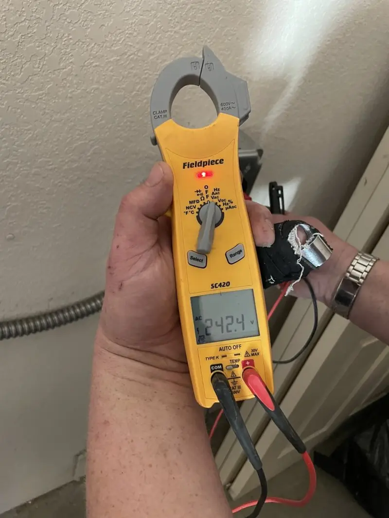 Voltage testing with clamp meter during Outlet Installation in Goose Creek